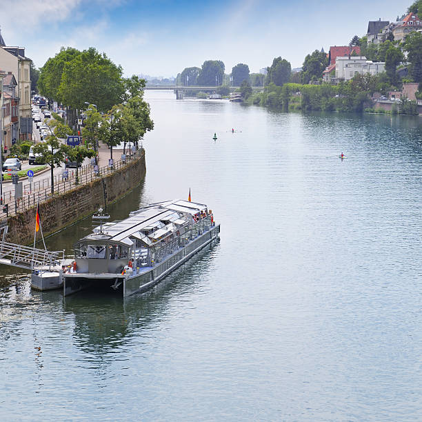istock river, urban promenade and pleasure vessel 524452537