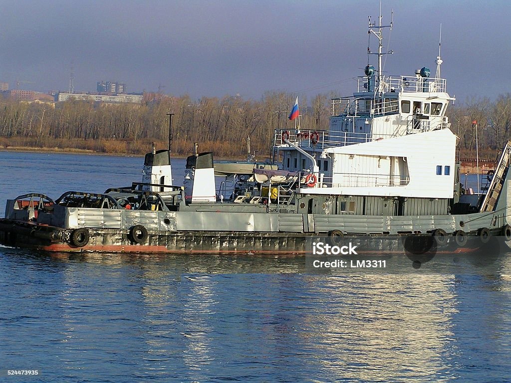 River ship tug pusher power 700 HP. Blue Stock Photo