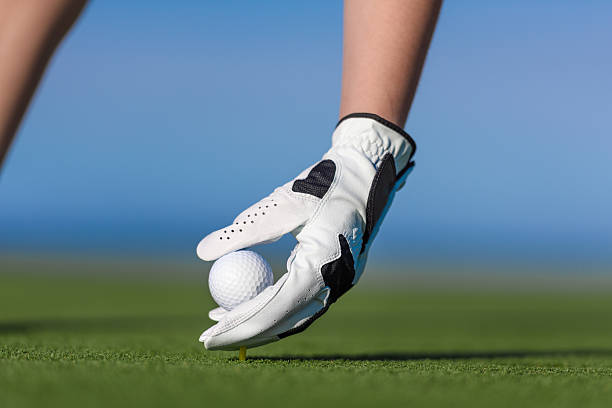 ready to play woman hand with golf glove ready to play. golf glove stock pictures, royalty-free photos & images