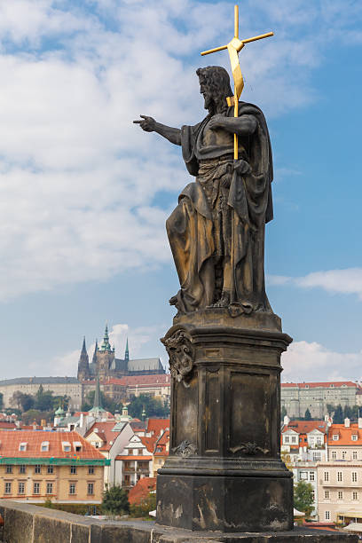 istock John the Baptist statue on the Charles Bridge in Prague 524479419