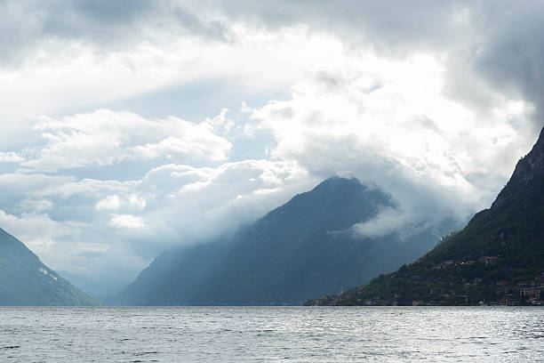 istock View across lake to mountains and clouds 524507241