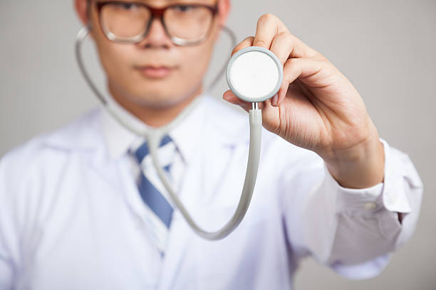 istock Asian male doctor with  stethoscope 524508353
