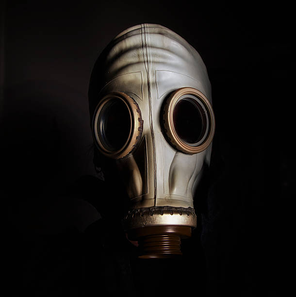 istock Environmental disaster. Post apocalyptic survivor in gas mask 524508799