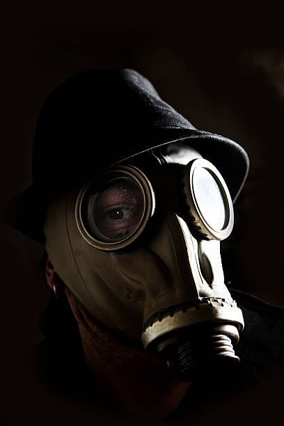 istock Environmental disaster. Post apocalyptic survivor in gas mask 524508845