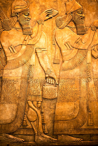 istock Egyptian nobles engraved in stone background 524510069