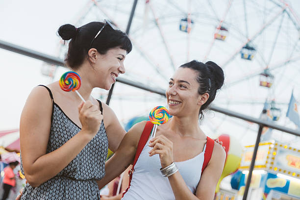 istock Happy Young Women eating Lollipop 524510093