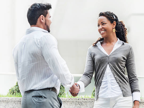 istock Business people shaking hands outdoors. 524512227