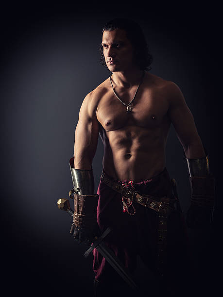 istock half-naked warrior with a sword in medieval clothes 524514671