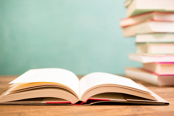 istock Back to school. Education. Textbooks on desk. Chalkboard. 524524898