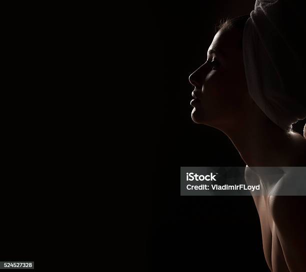 Woman Relaxing Stock Photo - Download Image Now - Dark, Profile View, Black Color