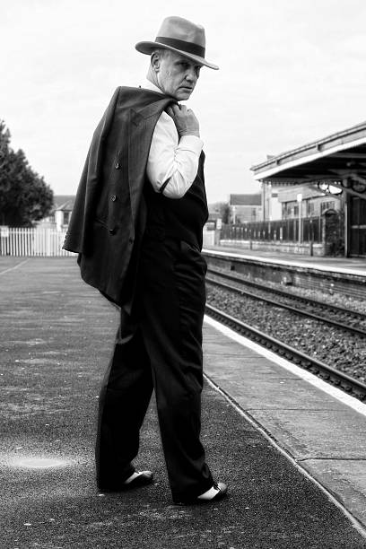 istock Gangster like figure at railway station 524527882