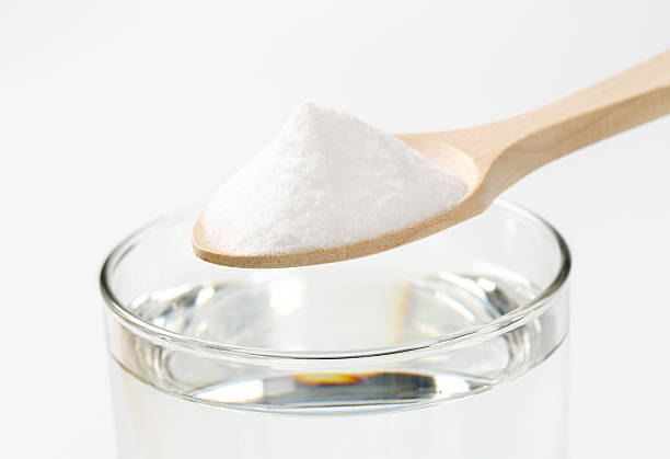 istock spoon of baking soda 524528464