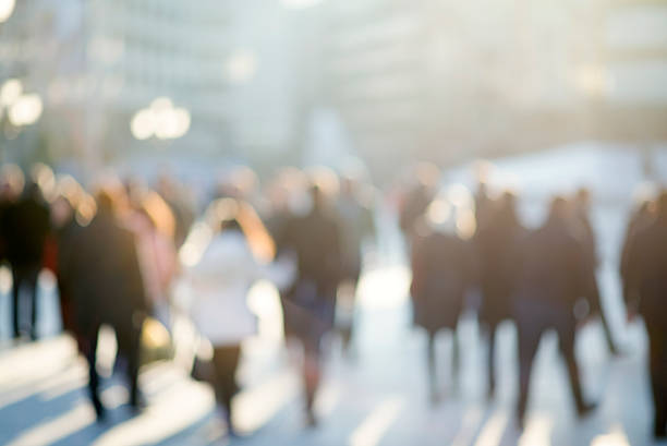 istock blur abstract people background, unrecognizable silhouettes of p 524530110