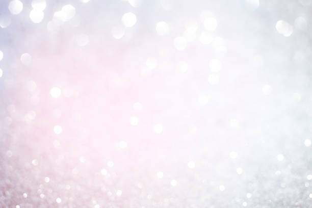 istock Silver glittering christmas lights. Blurred abstract background 524530478