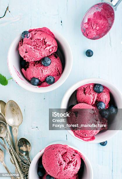 Homemade Blueberry Ice Cream Scoops With Fresh Berries And Mint Stock Photo - Download Image Now