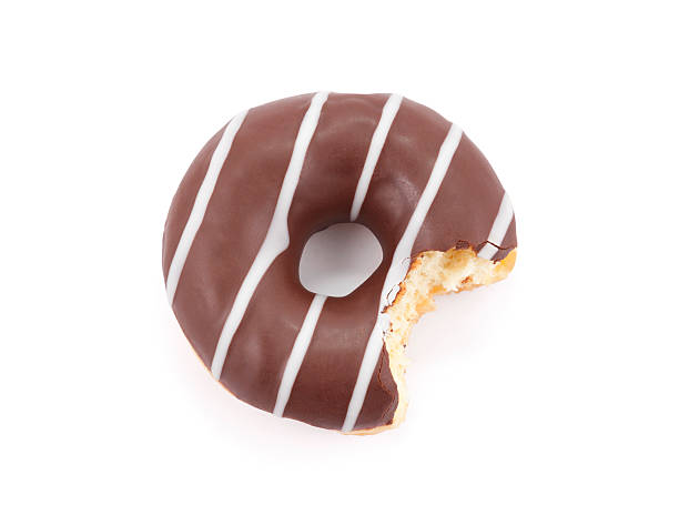 istock Bitten chocolate donut isolated on white with clipping path 524531208