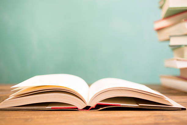 istock Back to school. Education. Textbooks on desk. Chalkboard. 524531760