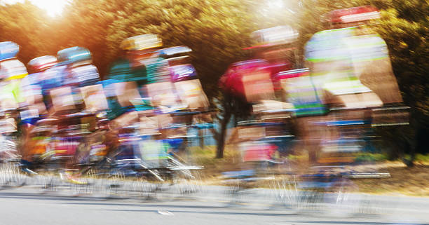 istock Group of cyclists on fun ride blurred by speed 524532820