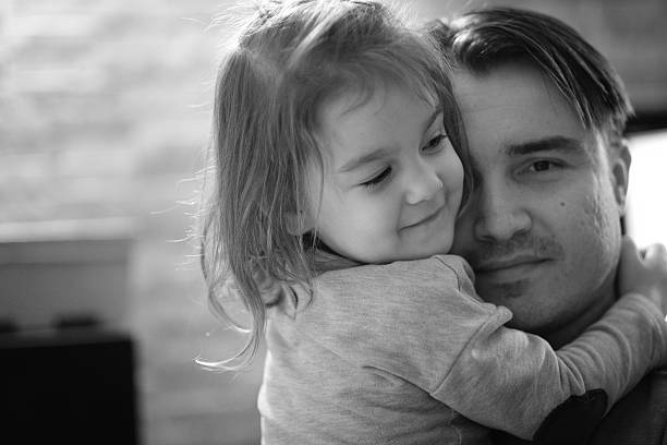 istock father and daughter hug 524533748