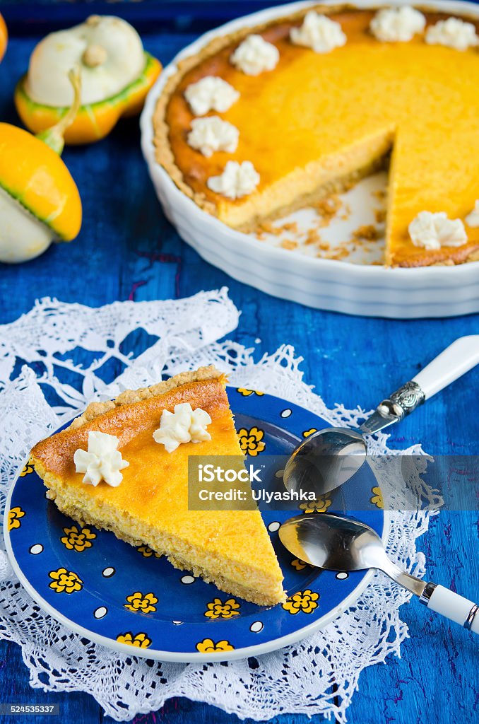 Pumpkin tart with ricotta Pumpkin tart with ricotta  with ricotta cheese on a wooden background Autumn Stock Photo