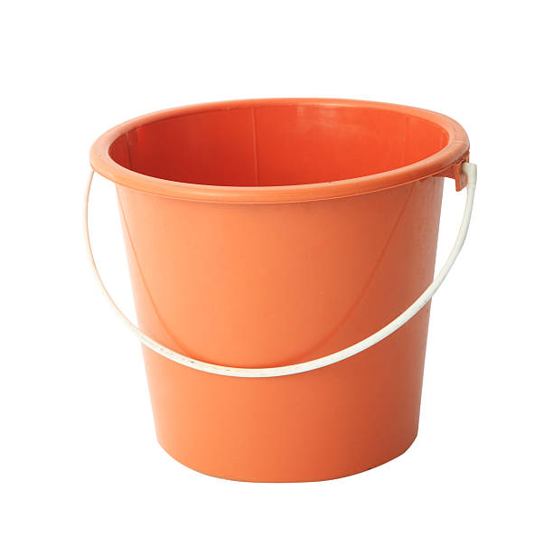 istock Red or orange plastic bucket isolated on white 524535933
