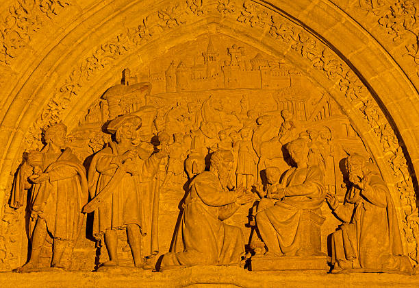 Seville - The Three Magi scene on the Puerta de los Palos on the  Cathedral de Santa Maria de la Sede by Miguel Perrin (1481)