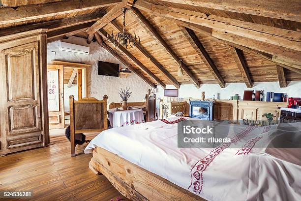 Rustic Attic Bedroom Interior Stock Photo - Download Image Now - Indoors, Cottage, Bedroom