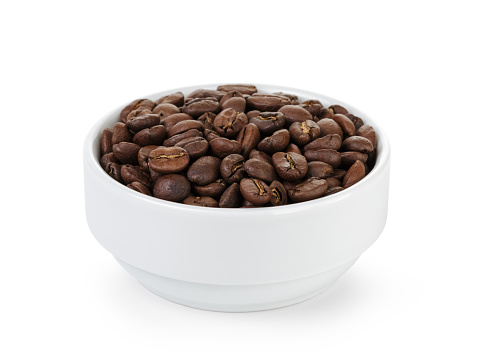 roasted coffee beans in bowl, isolated on white
