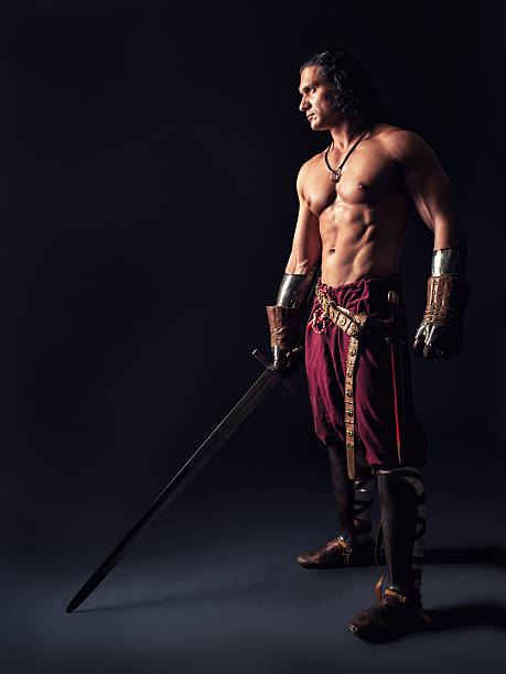 istock half-naked warrior with a sword in medieval clothes 524536827