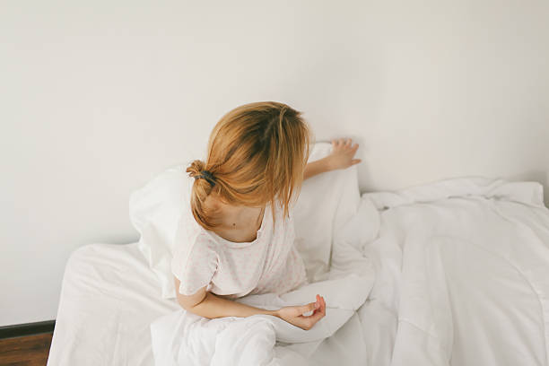 istock Girl in bed 524536857
