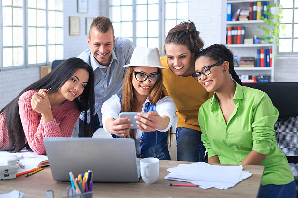 istock Young people making selfie at the office 524537046