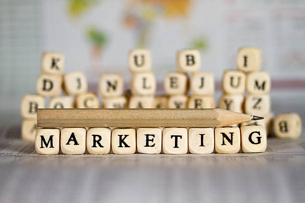istock marketing word on newspaper background 524537083