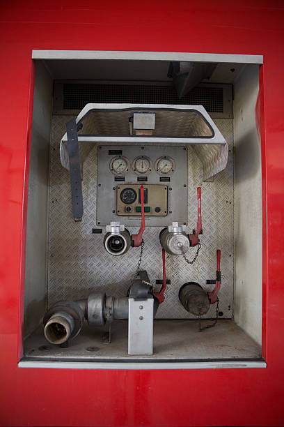 istock Fire pump engine with water hoses and valves 524538158