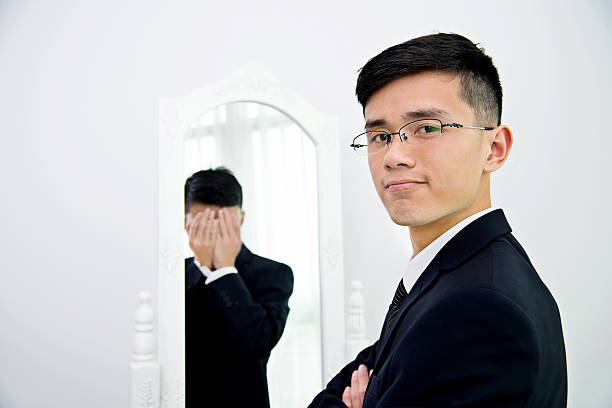 istock Businessman with bipolar disorder 524538594