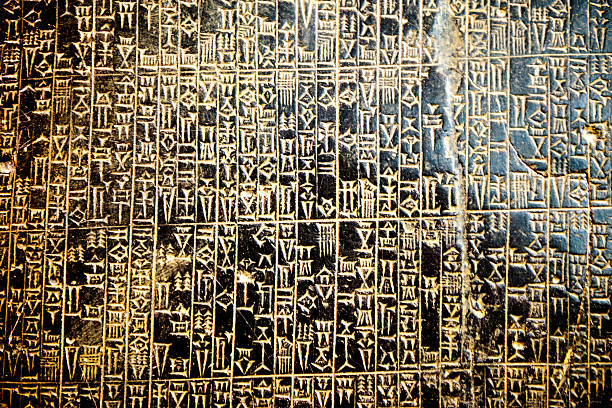 istock elements of ancient Egyptian cuneiform background 524539401