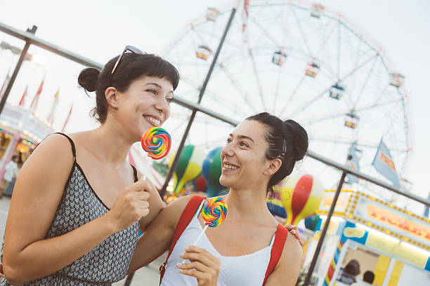 istock Happy Young Women eating Lollipop 524540099