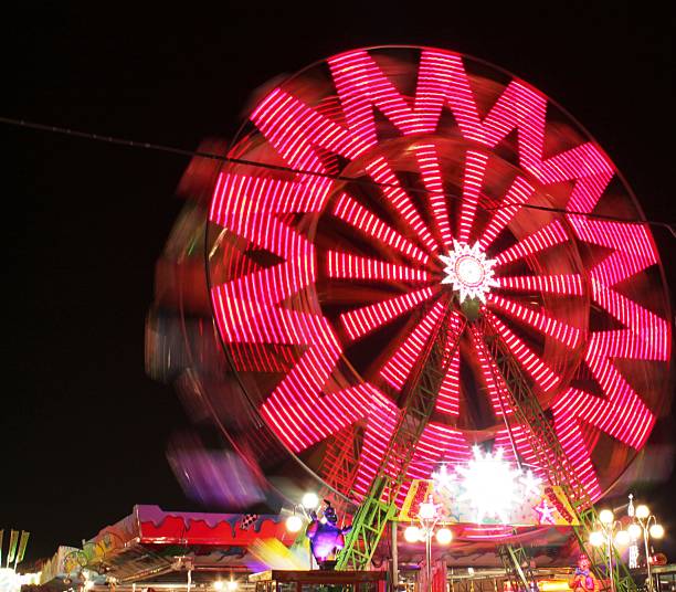 istock amusement park: Ferris wheel skis on the move 524540729