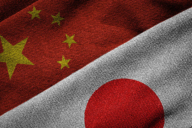 istock Flags of China and Japan on Grunge Texture 524541079
