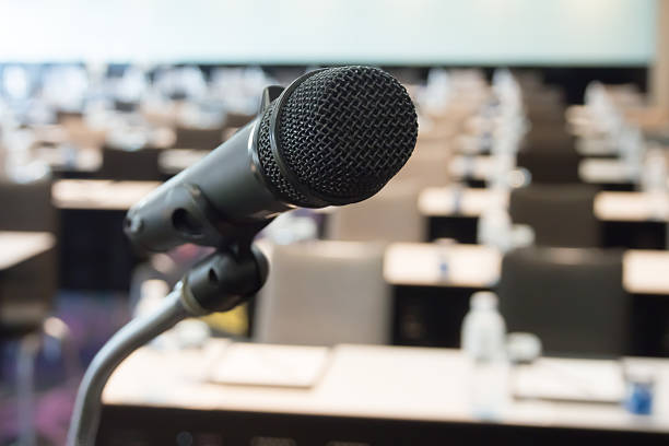 istock Black Microphone in concert hall or conference room 524541482