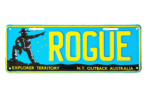Sydney, Australia - November 22, 2014: An expired Northern Territory personalised vehicle license plate, bearing the characters ROGUE and slogan 'Explorer Territory'. Depicted is John McDouall Stuart, an explorer who led the first team that crossed the Australian mainland from south to north.