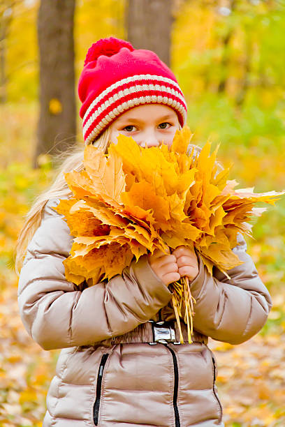 istock Cute girl in autumn 524542893