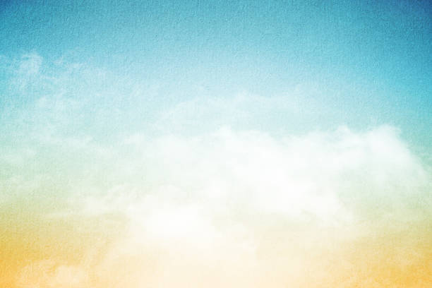 istock artistic fluffy cloud and sky with grunge paper texture 524543156