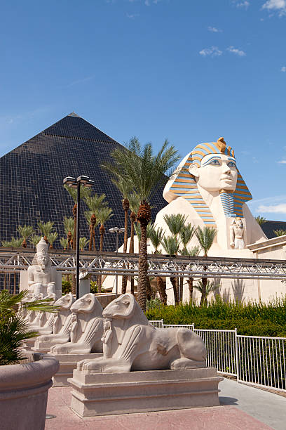 Luxor Casino and Hotel in Las Vegas , Nevada Las Vegas, Nevada, USA - September 20, 2014: Luxor Hotel and Casino located on the southern end of  Las Vegas Blvd has the form of an Egyptian pyramid at the entrance stands a large statue of the Sphinx  las vegas metropolitan area luxor luxor hotel pyramid stock pictures, royalty-free photos & images