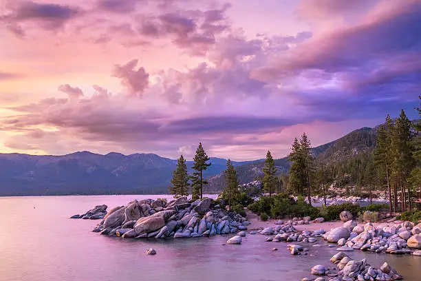 Sunset with cloudy sky over Sand harbor, Lake Tahoe.