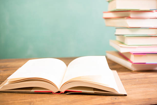istock Back to school. Education. Textbooks on desk. Chalkboard. 524545826