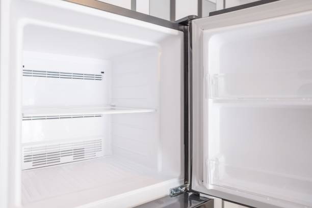 An empty freezer of a refrigerator stock photo