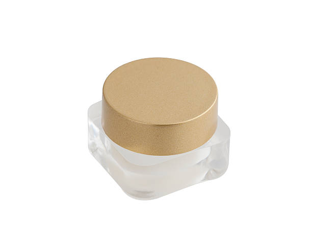 istock Lip balm in a jar  isolated on white background 524548268