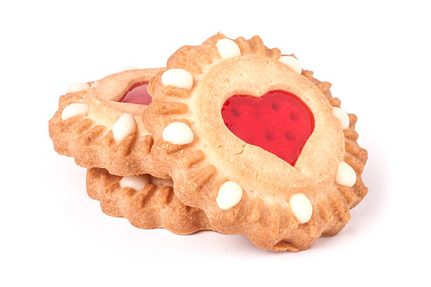 istock three cookies with marmalade heart isolated on white background 524548508