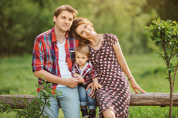 istock Happy family in a park 524549566