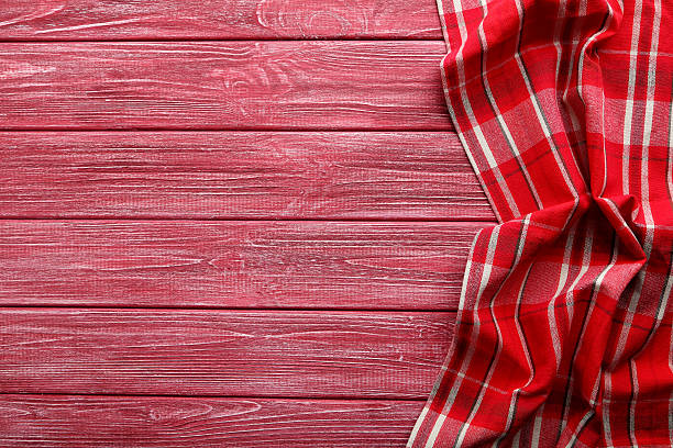 istock Napkin on red wooden table, close up 524551494